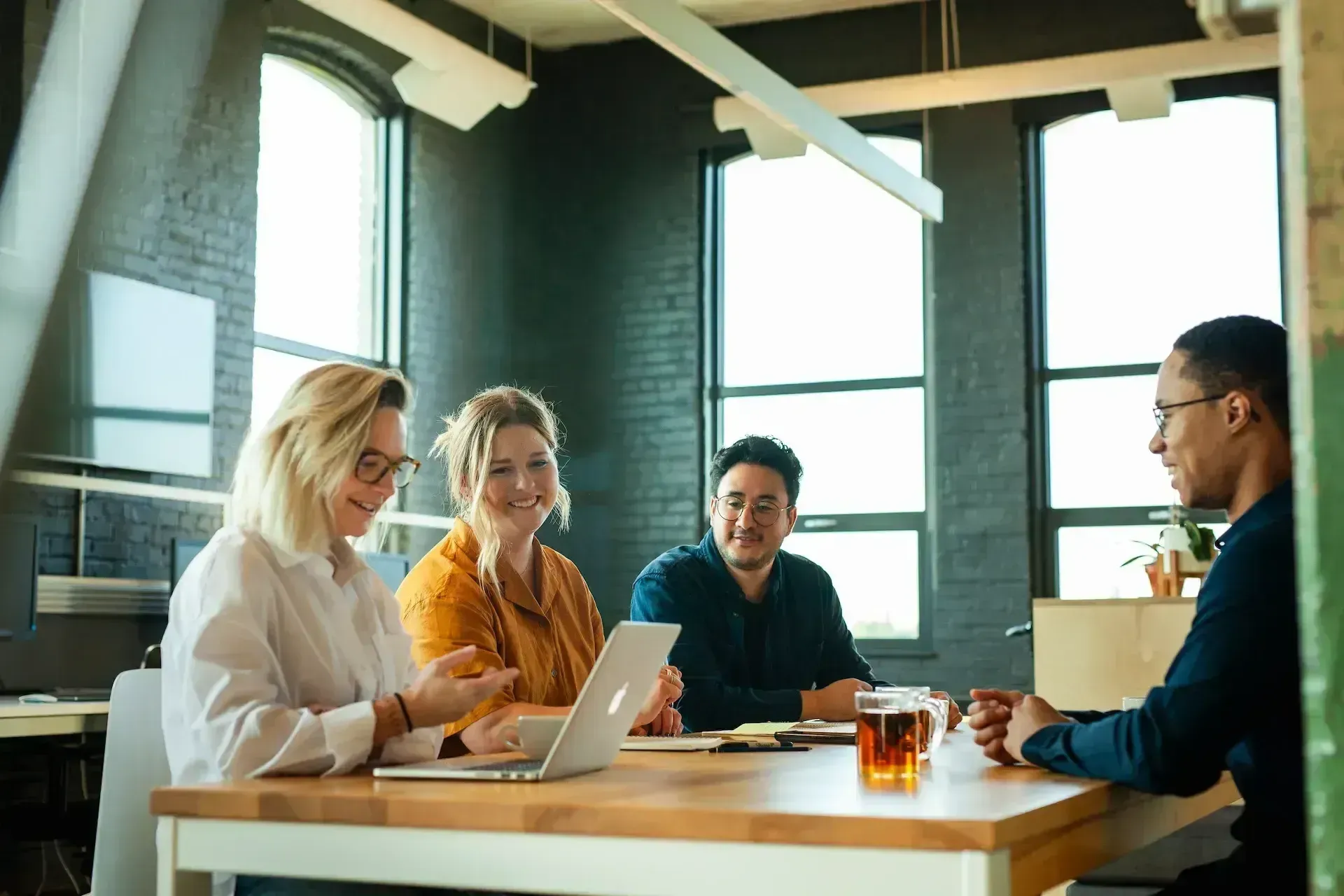 people looking at a pc